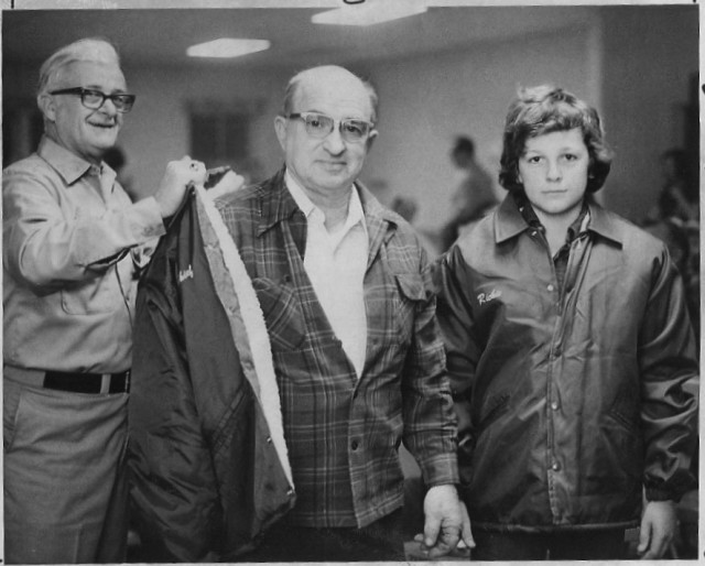 From the Archives:  This picture is from The Westerly Sun on 12/8/74.  The caption reads: &quot;Two members of the Dunn's Corners Fire Department were given special recognition during a monthly dinner meeting of the department last Wednesday night.  Chief Henry Morris (center) and Richard Champlin Jr. (right), a junior member, were given new jackets by the other members of the department; Morris for his leadership and Champlin for a variety of extra services performed over the year.  Champlin models his coat while John R. Nolan, president of the department, helps Morris into his.&quot;